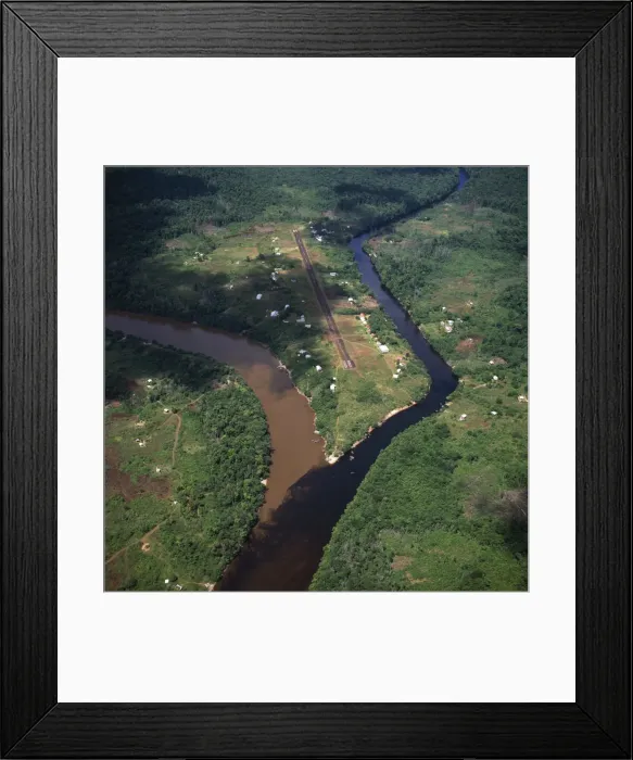 Framed Print : Aerial image of Kamarang Mouth Station and airstrip at the confluence of the unpolluted Kamarang River with the mined and heavily polluted Upper Mazaruni River in March 2005, Guyana Framed Print : Aerial image of Kamarang Mouth Station and airstrip at the confluence of the unpolluted Kamarang River with the mined and heavily polluted Upper Mazaruni River in March 2005, Guyana