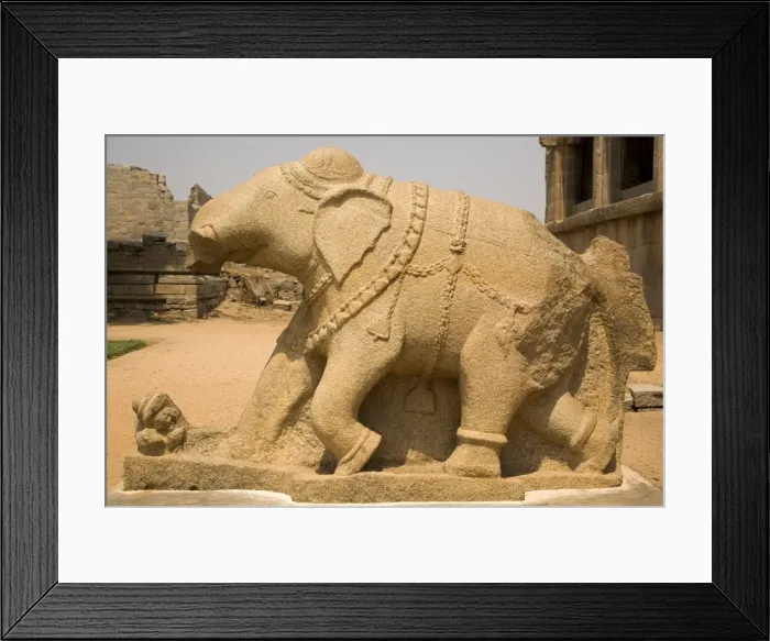Framed Print : An elephant sculpture, with a broken trunk, adorns the royal Elephant Stables at Hampi Framed Print : An elephant sculpture, with a broken trunk, adorns the royal Elephant Stables at Hampi