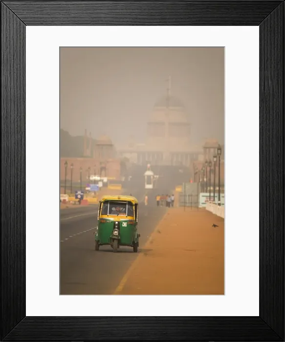 Framed Print : An auto rickshaw drives along the Rajpath, in front of the Rashtrapati Bhavan Framed Print : An auto rickshaw drives along the Rajpath, in front of the Rashtrapati Bhavan