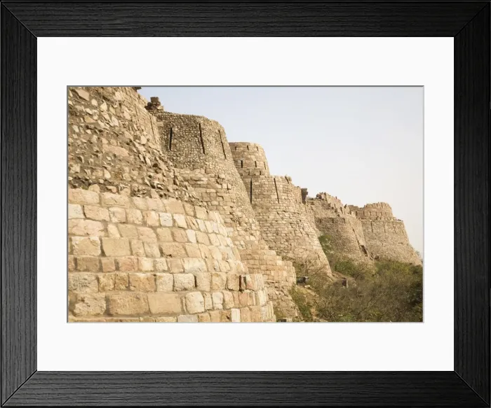 Framed Print : The 15 metre high curtain walls of the fourteenth century Tughluqabad Fortress in Delhi
