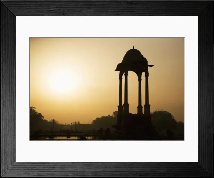 Framed Print : Sunrise silhouettes a chhattri in New Delhi, India, Asia Framed Print : Sunrise silhouettes a chhattri in New Delhi, India, Asia