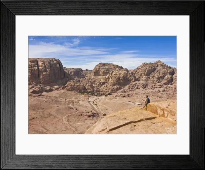 Framed Print : Traveller enjoying the view over Petra, UNESCO World Heritage Site, Jordan, Middle East Framed Print : Traveller enjoying the view over Petra, UNESCO World Heritage Site, Jordan, Middle East