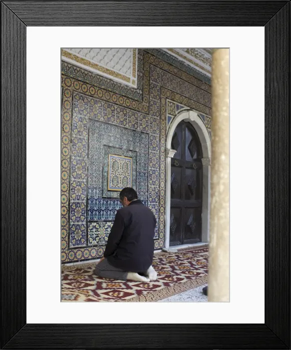 Framed Print : Man praying at the mosque in the suk of the Medina, Tripoli, Libya, North Africa, Africa Framed Print : Man praying at the mosque in the suk of the Medina, Tripoli, Libya, North Africa, Africa