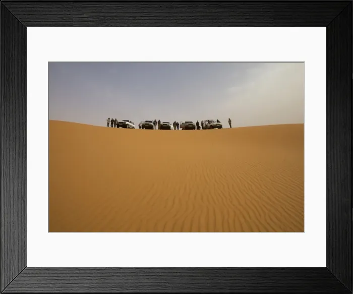 Framed Print : A group of 4x4 vehicles in the dunes of the erg of Murzuk in the Fezzan desert Framed Print : A group of 4x4 vehicles in the dunes of the erg of Murzuk in the Fezzan desert
