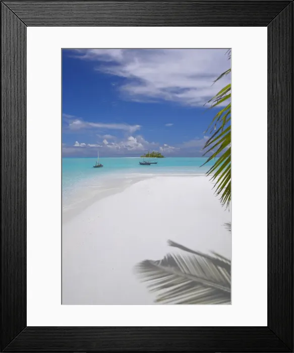 Framed Print : Small fishing boats (dhoni) in clear water and remote island in background Framed Print : Small fishing boats (dhoni) in clear water and remote island in background
