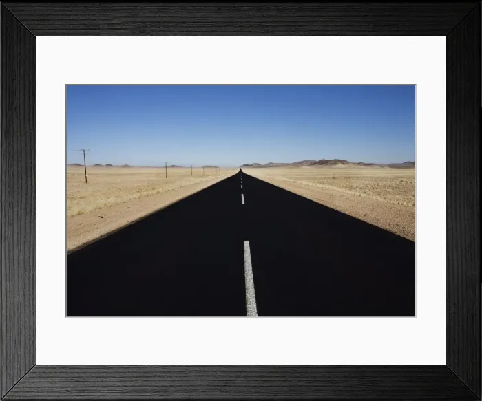 Framed Print : Tarmac road out of Luderitz heading north, Namibia, Africa Framed Print : Tarmac road out of Luderitz heading north, Namibia, Africa