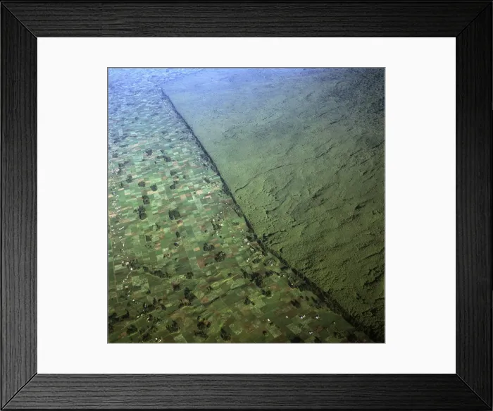 Framed Print : Aerial view of of Virunga National Park (Parc National des Volcans) showing the boundary of the park and agricultural land, Virunga Volcanoes Framed Print : Aerial view of of Virunga National Park (Parc National des Volcans) showing the boundary of the park and agricultural land, Virunga Volcanoes