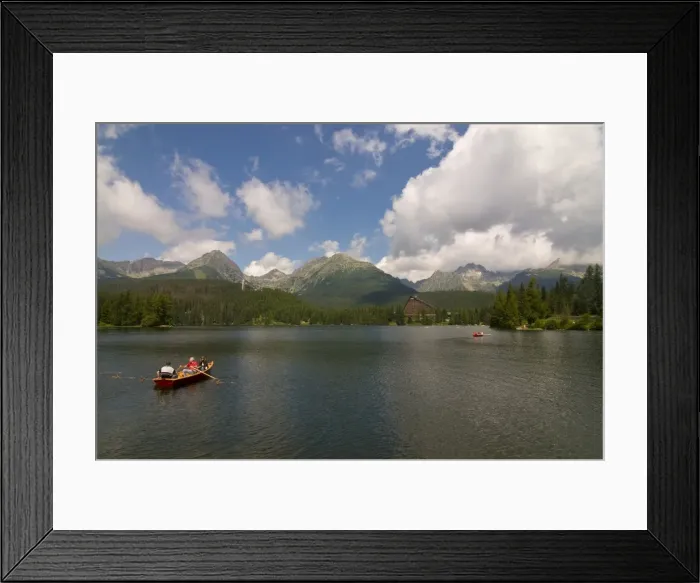 Framed Print : Tourists in a canoe at the Glacier lake of Strebske Pleso in the High Tatra Framed Print : Tourists in a canoe at the Glacier lake of Strebske Pleso in the High Tatra