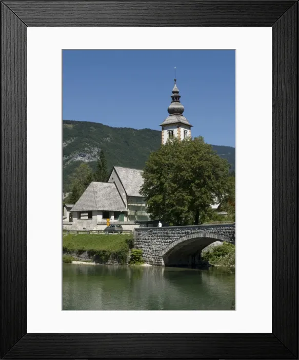 Framed Print : Church in village, bridge over Bohinj Lake, Slovenia, Europe Framed Print : Church in village, bridge over Bohinj Lake, Slovenia, Europe
