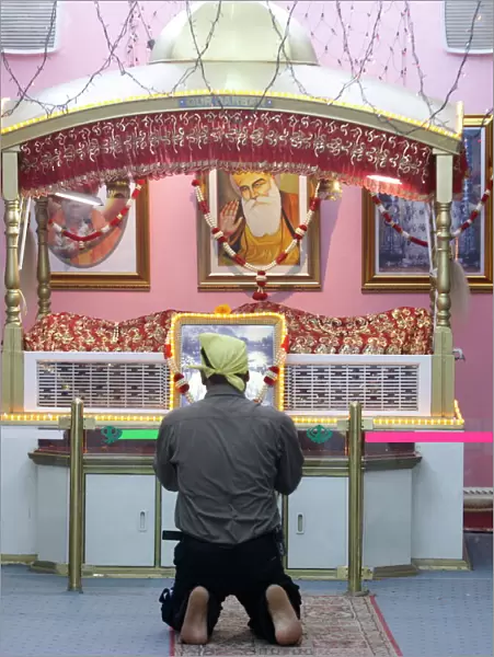 Man praying in Sikh Temple, Dubai, United Arab Emirates, Middle East