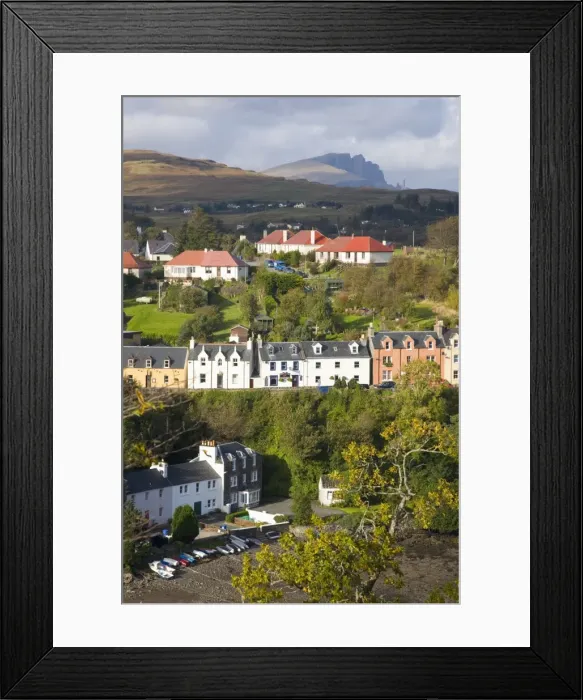 Framed Print : Houses on hillside overlooking the harbour, the Storr visible on horizon Framed Print : Houses on hillside overlooking the harbour, the Storr visible on horizon