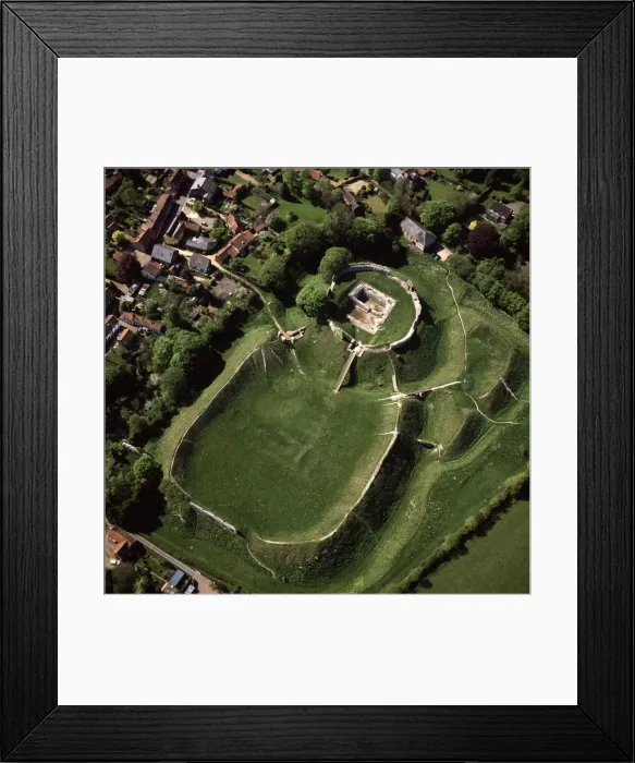 Framed Print : Aerial view of Castle Acre, remains of a motte and bailey castle with extensive earthworks Framed Print : Aerial view of Castle Acre, remains of a motte and bailey castle with extensive earthworks