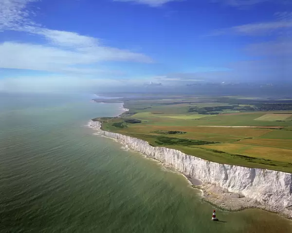 Aerial image of chalk cliffs and lighthouse at Beachy Head, near Eastbourne