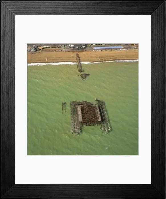 Framed Print : Aerial image of the burnt-out West Pier, Brighton, Sussex, England, United Kingdom Framed Print : Aerial image of the burnt-out West Pier, Brighton, Sussex, England, United Kingdom