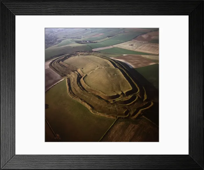 Framed Print : Aerial image of Maiden Castle, an Iron Age hill fort, Winterborne Monkton Framed Print : Aerial image of Maiden Castle, an Iron Age hill fort, Winterborne Monkton