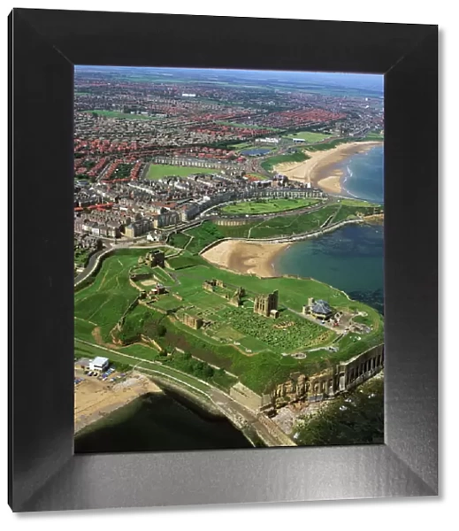 Aerial image of Tynemouth Priory and Castle, on a rocky headland known as Pen Bal Crag