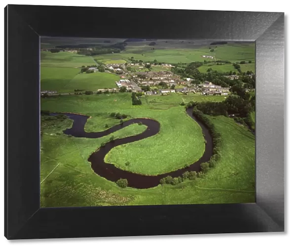 Aerial image of Otterburn, on the banks of the River Rede, Northumberland