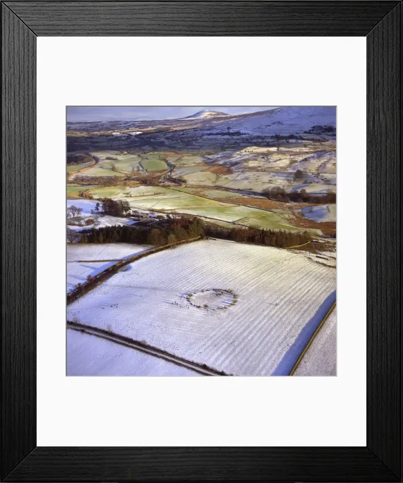 Framed Print : Aerial image of Castlerigg Stone Circle, a prehistoric monument in snow Framed Print : Aerial image of Castlerigg Stone Circle, a prehistoric monument in snow