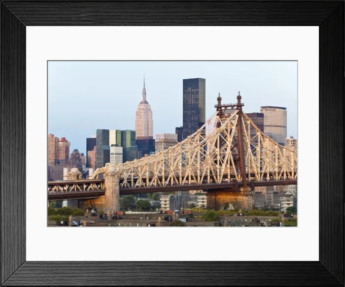 Framed Print : Queensboro Bridge, Manhattan skyline and the Empire State Building viewed from Queens at dawn Framed Print : Queensboro Bridge, Manhattan skyline and the Empire State Building viewed from Queens at dawn