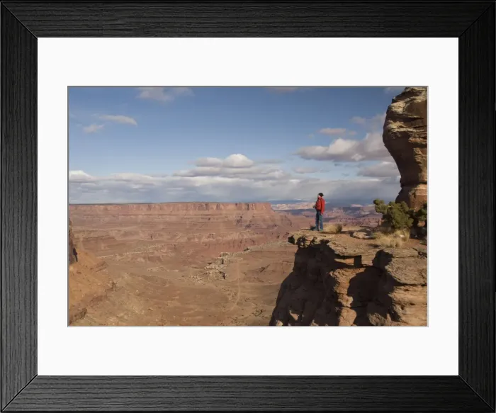 Framed Print : Tourist enjoying the view at Shafer Canyon Overlook, Canyonlands National Park Framed Print : Tourist enjoying the view at Shafer Canyon Overlook, Canyonlands National Park