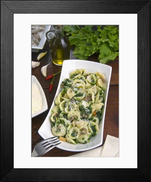 Framed Print : Orecchiette (little ears), a type of pasta of Apulia, with broccoli rabe and salted fish Framed Print : Orecchiette (little ears), a type of pasta of Apulia, with broccoli rabe and salted fish