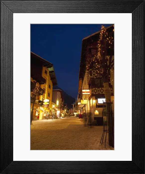 Framed Print : St. Anton am Arlberg high street in winter snow in the evening, Tyrol, Austrian Alps Framed Print : St. Anton am Arlberg high street in winter snow in the evening, Tyrol, Austrian Alps