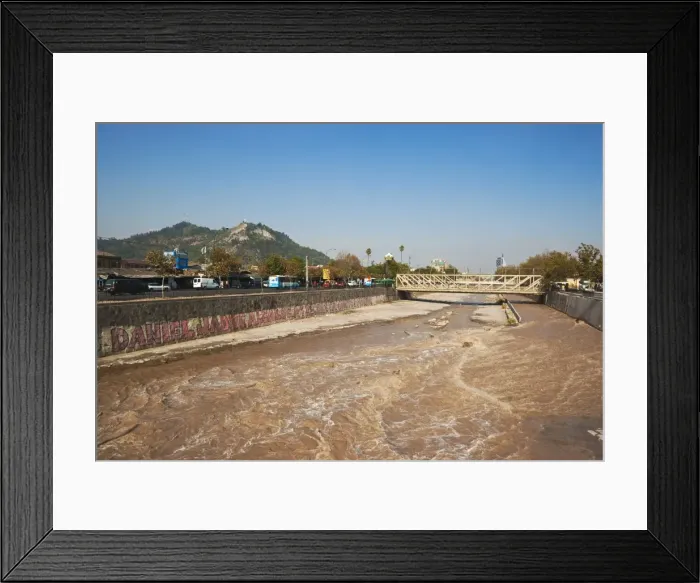 Framed Print : The Mapocho River, polluted by all kinds of sewage and copper mining waste Framed Print : The Mapocho River, polluted by all kinds of sewage and copper mining waste