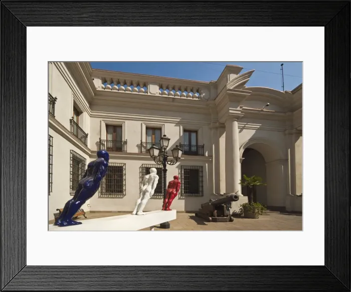 Framed Print : Cannon and modern art on display in an inner courtyard of the Palacio de La Moneda Framed Print : Cannon and modern art on display in an inner courtyard of the Palacio de La Moneda