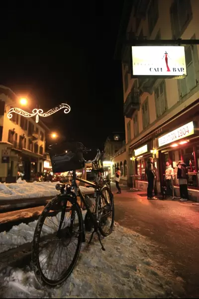 A bicycle propped up against a ski-rack outside the famous Elevation 1904 bar