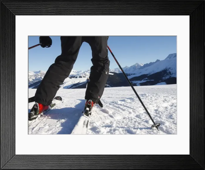 Framed Print : Skier in Megeve, Haute Savoie, French Alps, France, Europe Framed Print : Skier in Megeve, Haute Savoie, French Alps, France, Europe