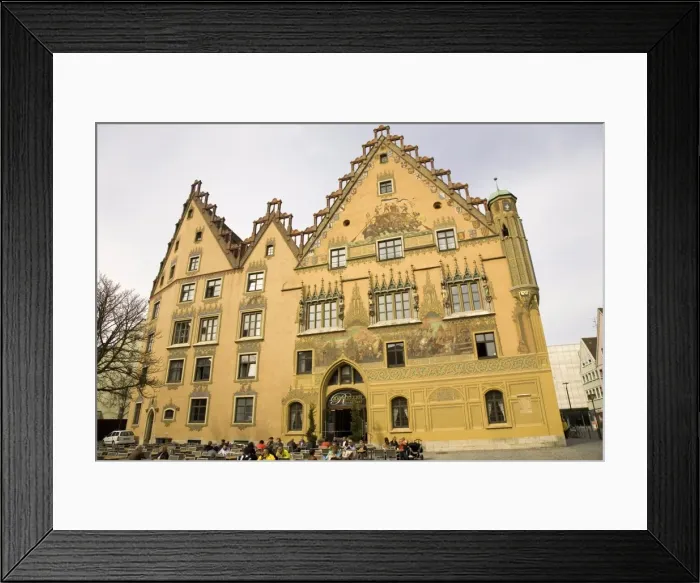 Framed Print : The painted facade of the medieval Ulmer Rathaus (Town Hall) shows scenes from German history Framed Print : The painted facade of the medieval Ulmer Rathaus (Town Hall) shows scenes from German history