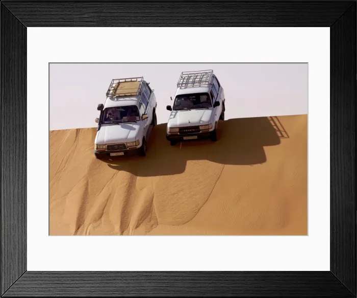 Framed Print : Two 4X4s on the dunes of the erg of Murzuk in the Fezzan Desert, Libya Framed Print : Two 4X4s on the dunes of the erg of Murzuk in the Fezzan Desert, Libya