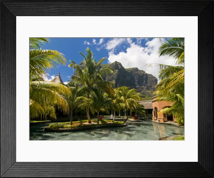 Framed Print : The pool of the Beachcomber Dinarobin six star hotel with Mont Brabant in the background Framed Print : The pool of the Beachcomber Dinarobin six star hotel with Mont Brabant in the background