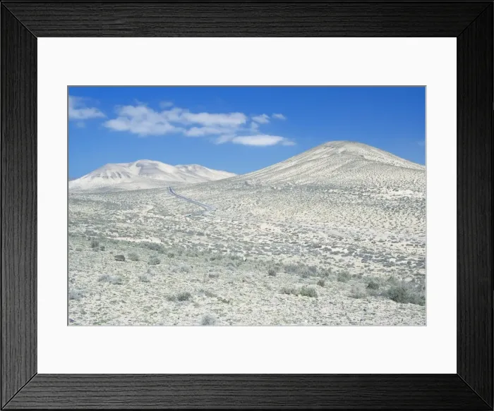 Framed Print : Road winding through the volcanic hills of Jandia Peninsula, Fuerteventura Framed Print : Road winding through the volcanic hills of Jandia Peninsula, Fuerteventura