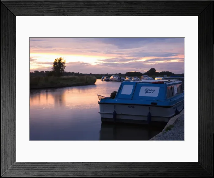 Framed Print : Pleasure boats moored on the River Ant, sunset, Norfolk Broads, Ludham Framed Print : Pleasure boats moored on the River Ant, sunset, Norfolk Broads, Ludham