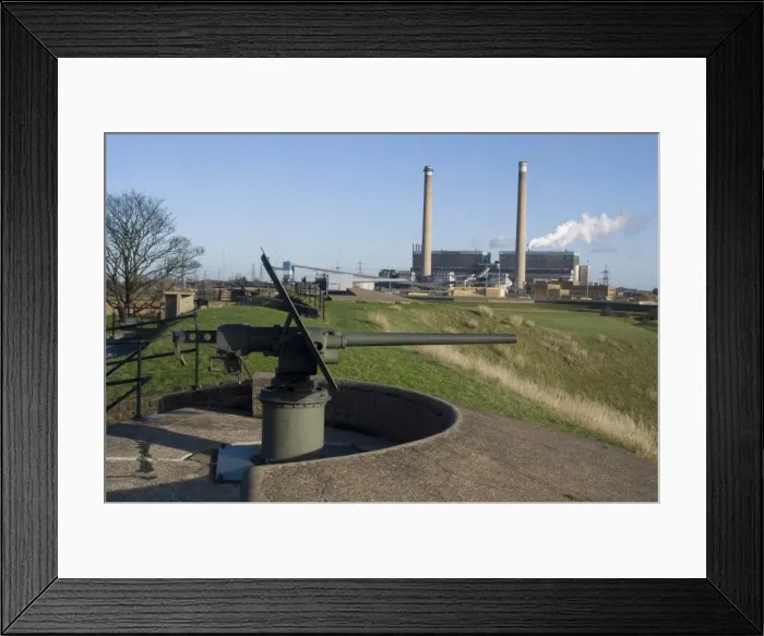 Framed Print : World War II gun with power station behind, at Tilbury Fort, used from the 16th to the 20th century Framed Print : World War II gun with power station behind, at Tilbury Fort, used from the 16th to the 20th century