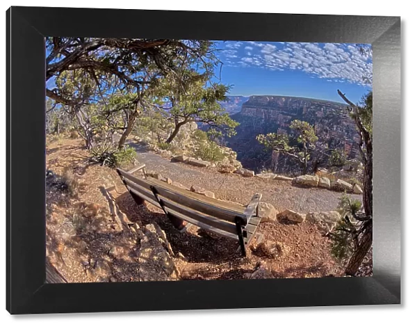 A bench along the rim trail overlooking Grand Canyon South Rim off Hermit Road, Grand Canyon, UNESCO World Heritage Site, Arizona, United States of America, North America