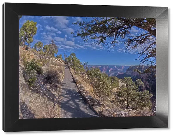 The paved rim trail along the cliffs of Grand Canyon South Rim between the village and Trailview Overlook Vista, Grand Canyon, UNESCO World Heritage Site, Arizona, United States of America, North America