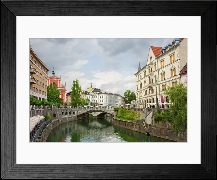 Framed Print : A stretch of the River Ljubljanica leading towards the Triple Bridge, designed in 1932 by Joze Plecnik, and city centre, Ljubljana, Slovenia, Europe Framed Print : A stretch of the River Ljubljanica leading towards the Triple Bridge, designed in 1932 by Joze Plecnik, and city centre, Ljubljana, Slovenia, Europe