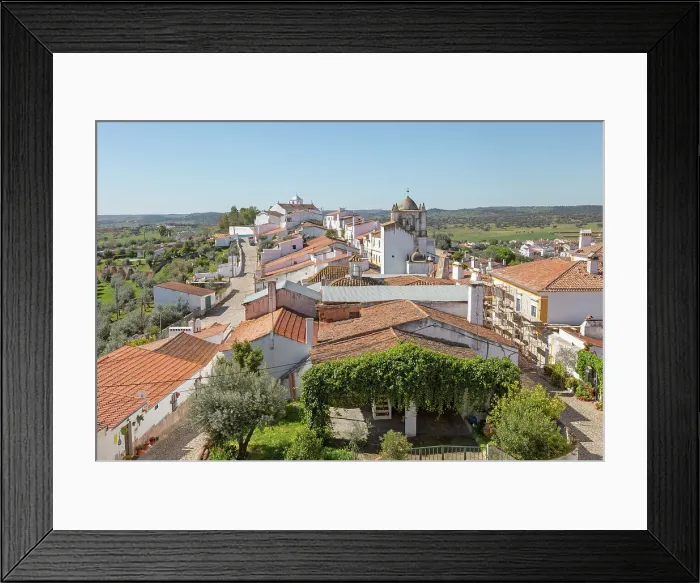 Framed Print : View over rooftops of whitewashed houses and streets in the small rural settlement village of Terena, Alentejo Central, Portugal, Europe Framed Print : View over rooftops of whitewashed houses and streets in the small rural settlement village of Terena, Alentejo Central, Portugal, Europe