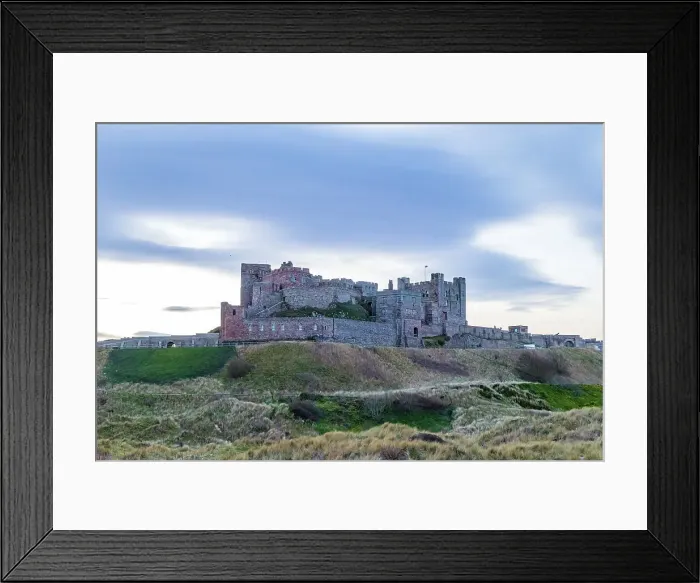Framed Print : Majestic medieval castle on a hill with cloudy sky at dusk, showcasing historical architecture, Northumberland, England, United Kingdom, Europe Framed Print : Majestic medieval castle on a hill with cloudy sky at dusk, showcasing historical architecture, Northumberland, England, United Kingdom, Europe