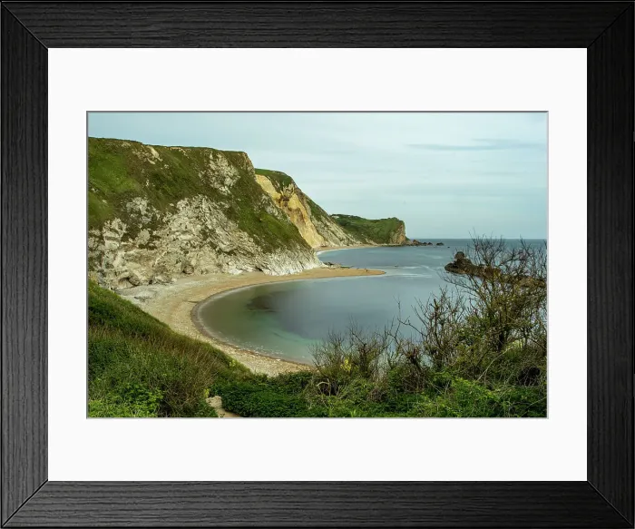 Framed Print : Scenic view of a tranquil cove with a sandy beach, surrounded by rugged cliffs under a clear blue sky at Durdle Door, Jurassic Coast, UNESCO World Heritage Site, Dorset, England, United Kingdom, Europe Framed Print : Scenic view of a tranquil cove with a sandy beach, surrounded by rugged cliffs under a clear blue sky at Durdle Door, Jurassic Coast, UNESCO World Heritage Site, Dorset, England, United Kingdom, Europe