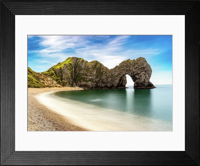 Framed Print : Scenic view of a natural arch on a coastline with a sandy beach and clear blue sky at Durdle Door, Jurassic Coast, UNESCO World Heritage Site, Dorset, England, United Kingdom, Europe Framed Print : Scenic view of a natural arch on a coastline with a sandy beach and clear blue sky at Durdle Door, Jurassic Coast, UNESCO World Heritage Site, Dorset, England, United Kingdom, Europe