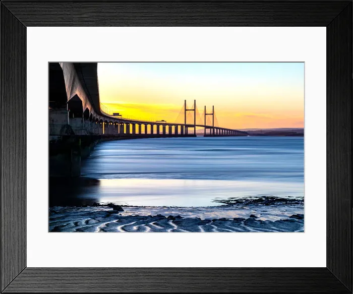 Framed Print : Long exposure of a serene sunset over the Prince of Wales Bridge, the Second Severn Crossing, M4 motorway over the River Severn, clear skies, and warm sunlight, between England and Wales, United Kingdom, Europe Framed Print : Long exposure of a serene sunset over the Prince of Wales Bridge, the Second Severn Crossing, M4 motorway over the River Severn, clear skies, and warm sunlight, between England and Wales, United Kingdom, Europe