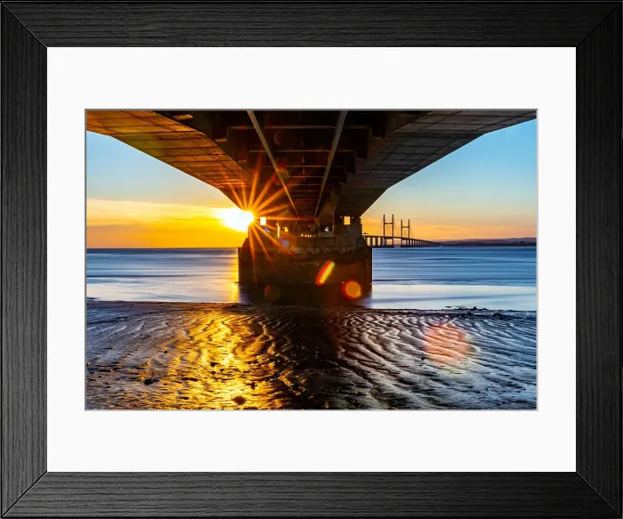 Framed Print : Sunset view under a pier with sunburst effect, reflecting on wet sand and calm water, Prince of Wales Bridge, the Second Severn Crossing, M4 motorway over the River Severn, between England and Wales, United Kingdom, Europe Framed Print : Sunset view under a pier with sunburst effect, reflecting on wet sand and calm water, Prince of Wales Bridge, the Second Severn Crossing, M4 motorway over the River Severn, between England and Wales, United Kingdom, Europe