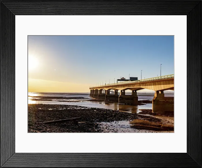 Framed Print : Sunset view of the Prince of Wales Bridge, the Second Severn Crossing, M4 motorway over the River Severn, reflections on water, clear skies, and warm sunlight, between England and Wales, United Kingdom, Europe Framed Print : Sunset view of the Prince of Wales Bridge, the Second Severn Crossing, M4 motorway over the River Severn, reflections on water, clear skies, and warm sunlight, between England and Wales, United Kingdom, Europe