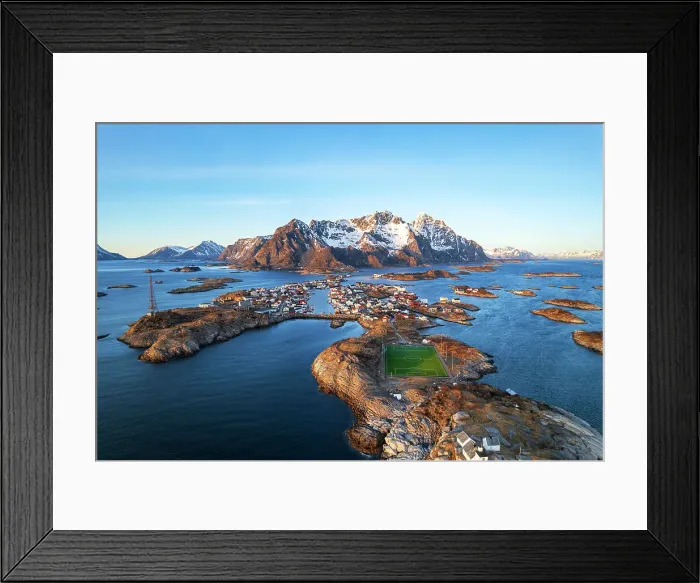 Framed Print : Sunset over the small village of Henningsvaer surrounded by snowy massif with the famous soccer field in the foreground, Henningsvaer, Vagan municipality, Nordland, Lofoten Islands, Norway, Scandinavia, Europe Framed Print : Sunset over the small village of Henningsvaer surrounded by snowy massif with the famous soccer field in the foreground, Henningsvaer, Vagan municipality, Nordland, Lofoten Islands, Norway, Scandinavia, Europe