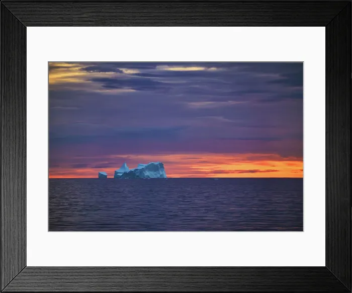 Framed Print : Iceberg against orange sunset sky, Antarctica, Polar Regions Framed Print : Iceberg against orange sunset sky, Antarctica, Polar Regions