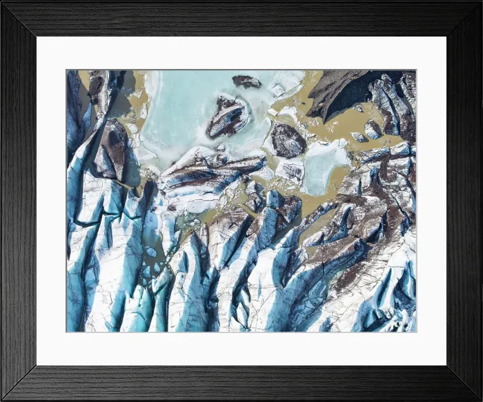 Framed Print : Aerial drone view of particular ice textures formed in the Svinafellsjokull glacier following global warming, Iceland, Polar Regions