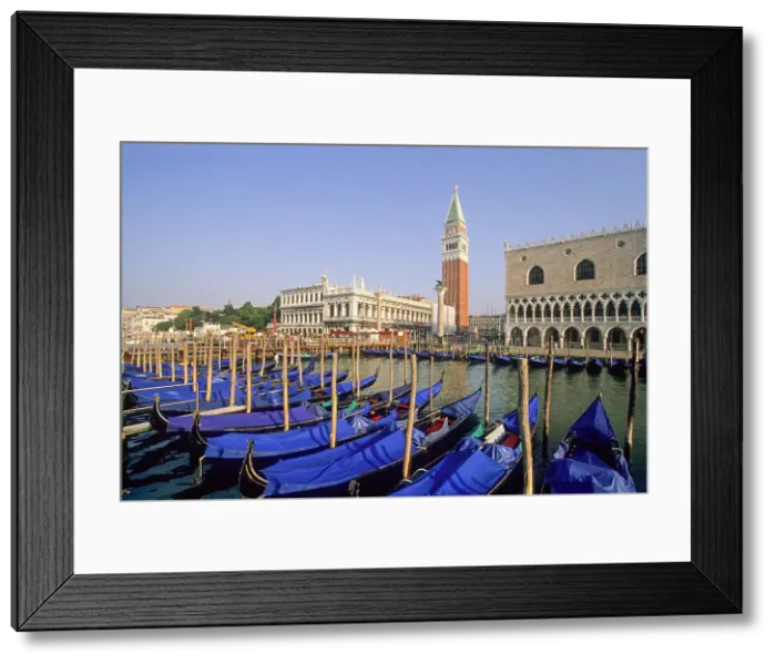 Framed Print : Gondolas moored at Riva degli Schiavoni with the Doges Palace and Campanile of San Marco background, Venice, UNESCO World Heritage Site, Veneto region, Italy, Europe